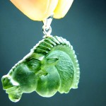 Carving (moldavite) - pendant - Capricorn