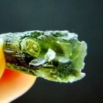 Moldavite with partially open channel