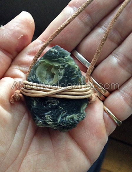 Moldavite wrapped with leather