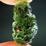 Moldavite with small damaged parts