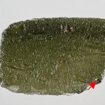 Slightly damaged moldavite