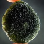 Large moldavite with big closed buuble