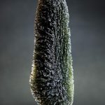 A moldavite with an unusual kind of damage