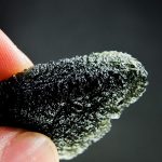 Naturally fragmented moldavite